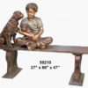 Bronze boy & dog on a bench