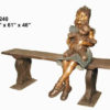 Bronze girl with cat on a bench