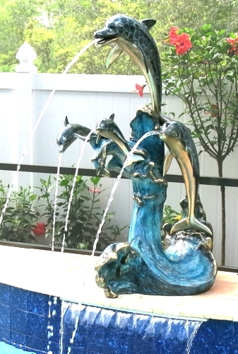 Bronze Dolphins Riding Wave Fountain