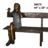 Bronze girl holding a bird on a bench