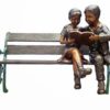 Bronze boy & girl reading on a bench