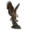 Bronze Eagle Catches Fish Statue