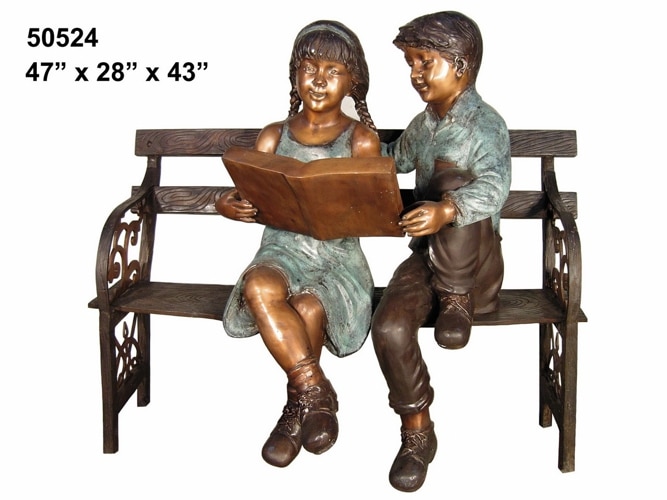 Bronze boy & girl reading on a bench - AF 50524
