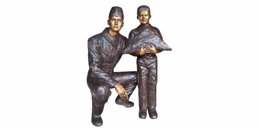 Bronze statue fold of hone Dan Rooney