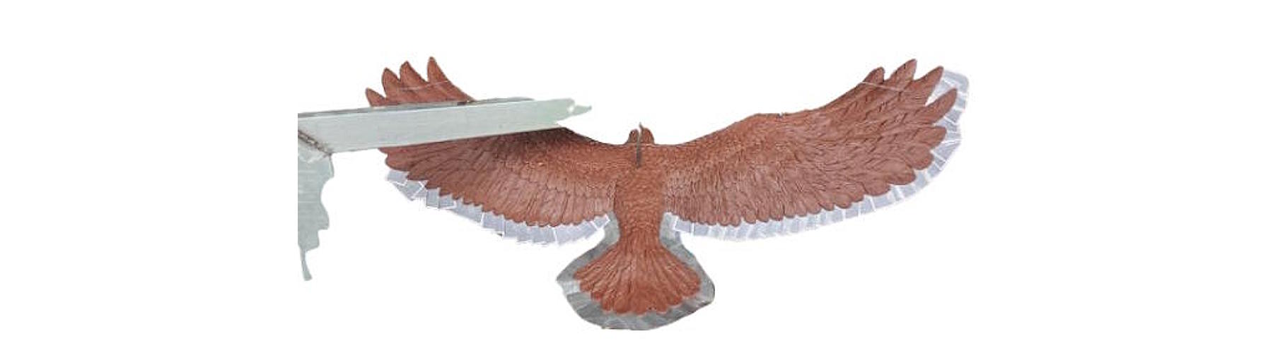 Plaster support mold section for the peregrine falcon's rock base, showing the multi-piece mold used to reproduce the sculpture's natural stone texture.