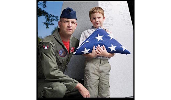 Lt. Col. Dan Rooney with Jacob Green, the photograph that inspired the custom bronze tribute created for Folds of Honor.
